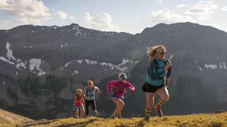 best running jacket: runners in the mountains
