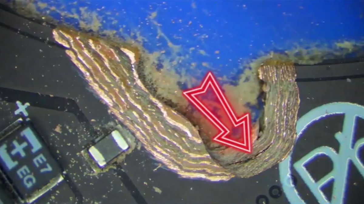 Razer laptop motherboard repair video showcases superhuman hand-soldering skills — PCB damage appears to be the result of a misplaced screw hole on a motherboard that one repairer says has 'a fatal design flaw'