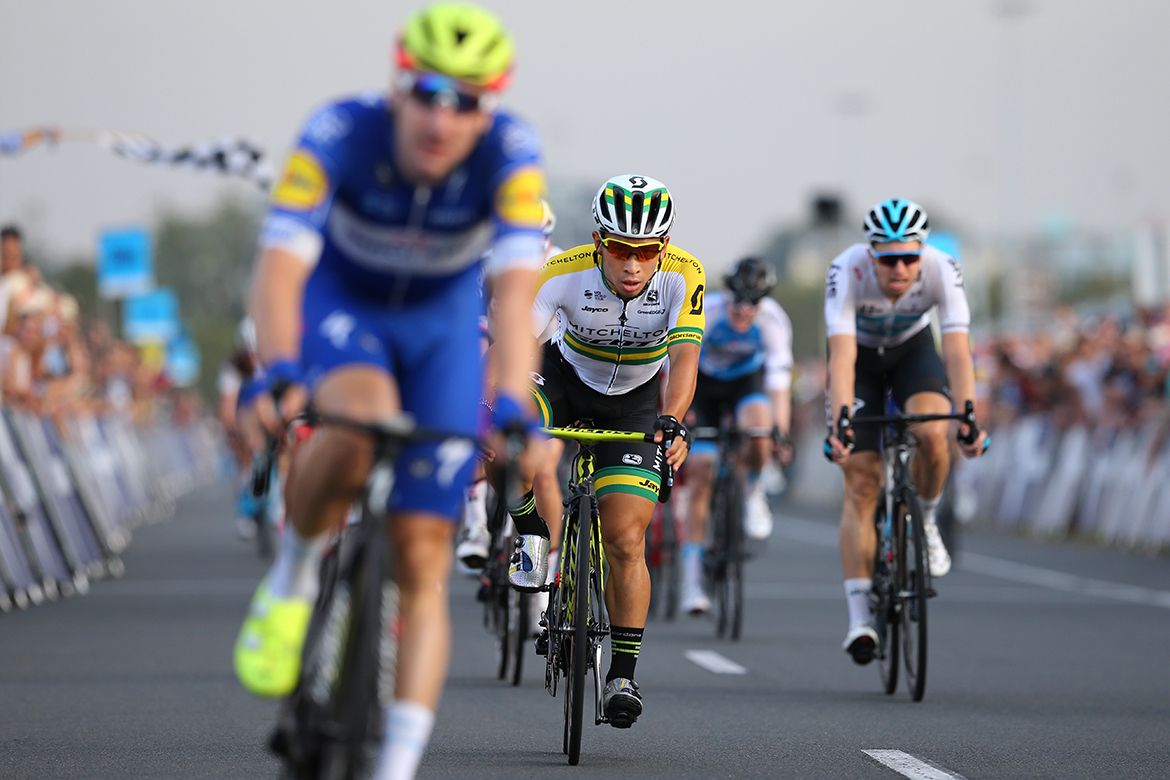 Caleb Ewan crosses the line
