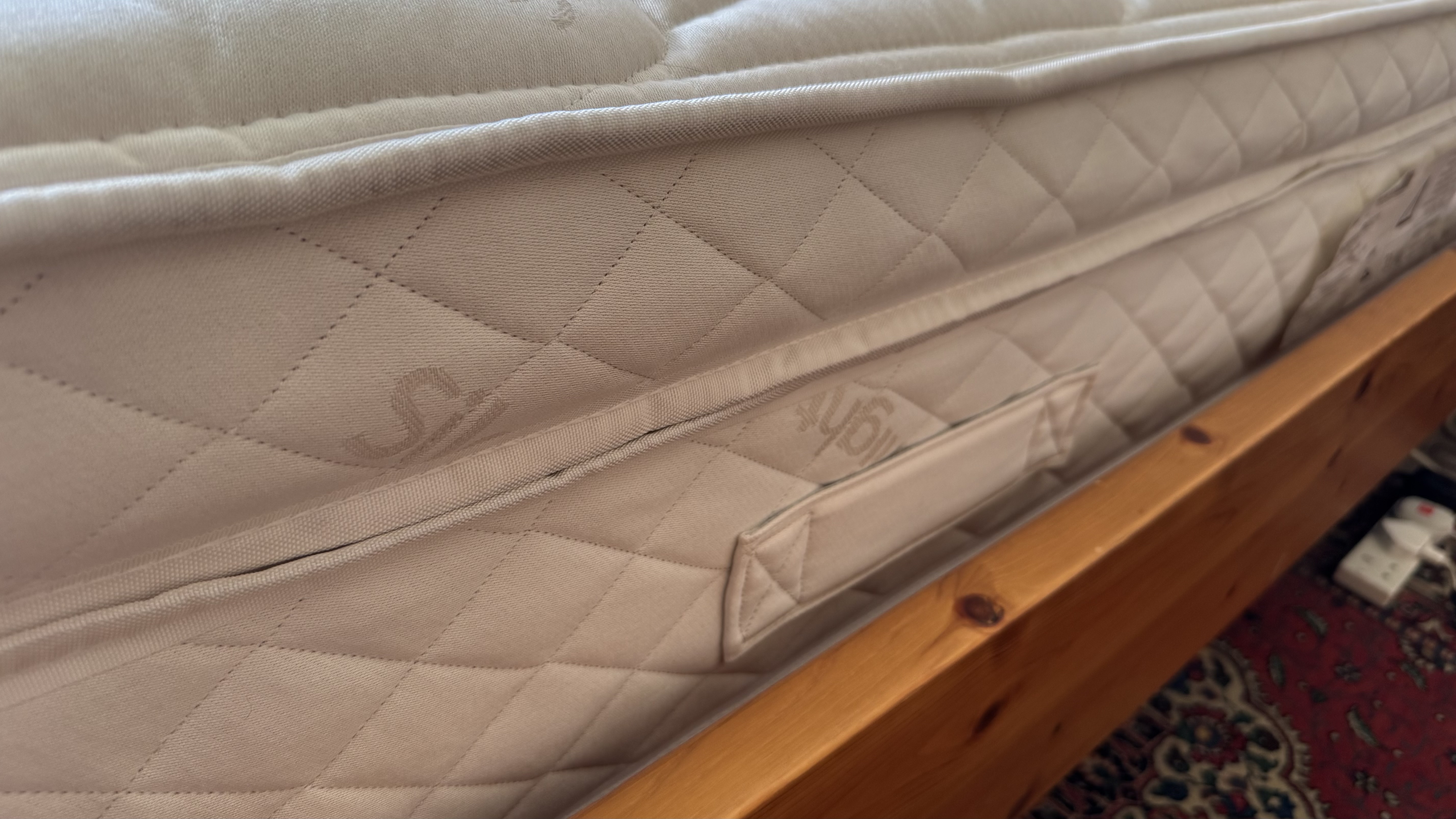 A close up of the side of the Premier Inn mattress, showing some of its layers