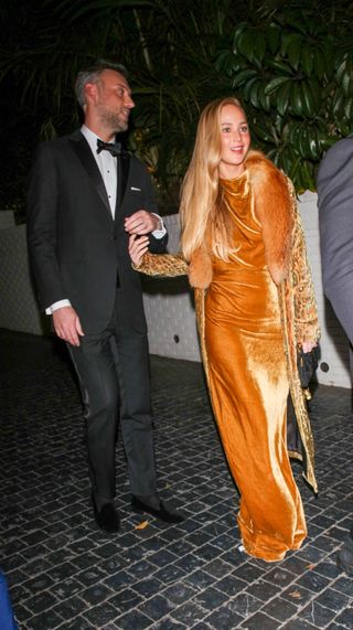 Jennifer Lawrence wearing a golden velvet dress to the 2024 Golden Globes after party