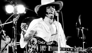 Sly Stone leads Sly & the Family Stone onstage at White City Stadium in London on July 15, 1973
