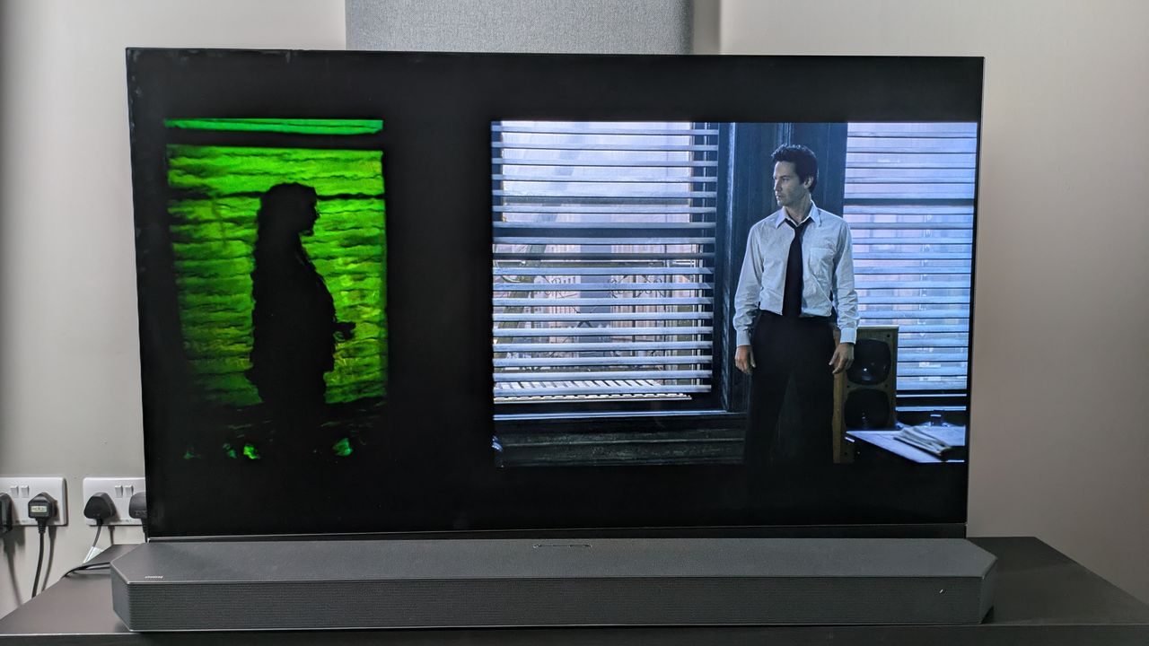 4K Blu-ray shot of Constantine and Angela in room