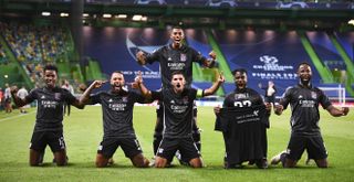 Lyon players celebrate victory over Man City