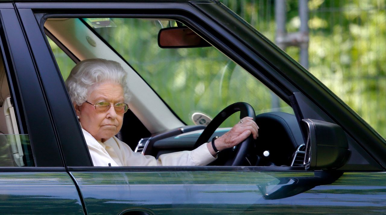 Queen Elizabeth II seen driving her Range Rover car as she watches the International Carriage Driving Grand Prix event on day 4 of the Royal Windsor Horse Show at Home Park on May 17, 2014 in Windsor, England. 