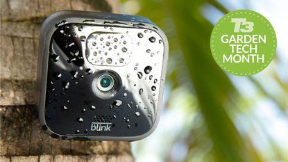 Blink smart security camera monitoring a garden with a T3 Garden Tech month badge
