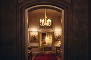 Family portraits viewed through an archway