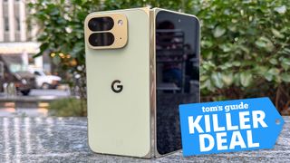 Google Pixel 10 Pro Fold on bench with view of urban street in the background and deal badge overlaid