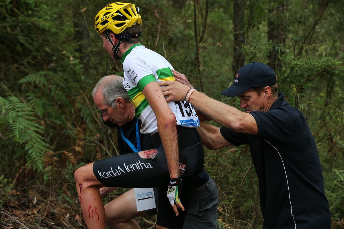 Lucas Hamilton gets assistance after a high-speed crash