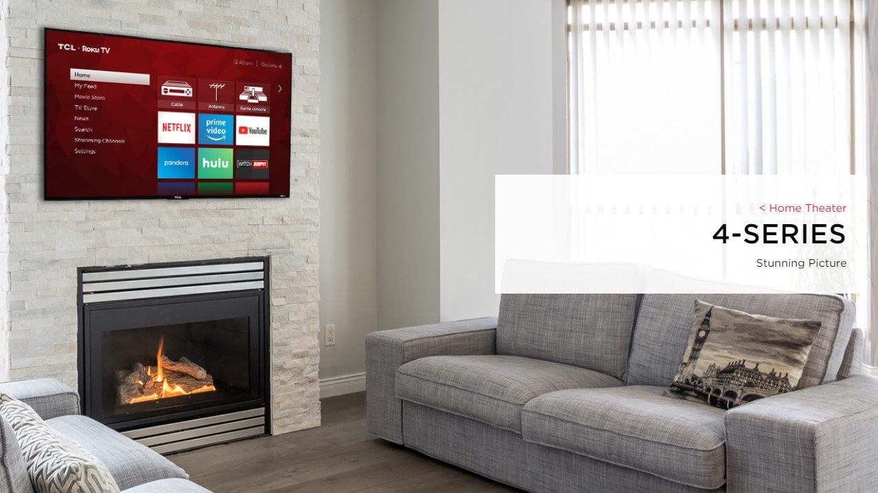 40-inch TCL TV hangs on wall above fireplace