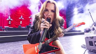 Lzzy Hale of Halestorm performs at Pine Knob Music Theatre on July 13, 2024 in Clarkston, Michigan. 