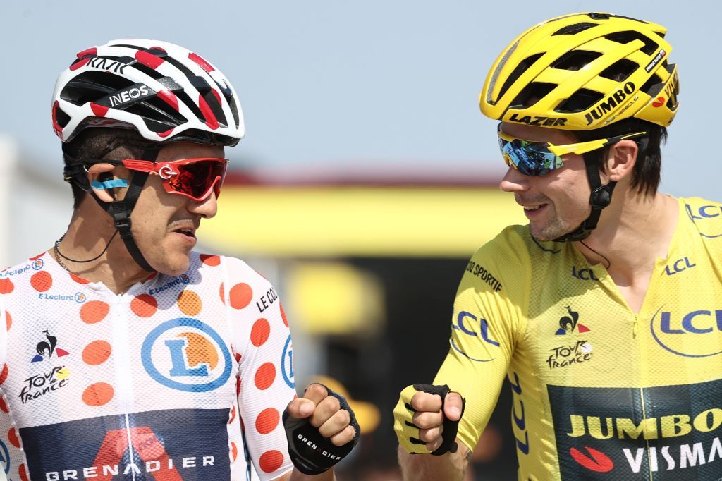 Team Jumbo rider Slovenias Primoz Roglic wearing the overall leaders yellow jersey and Team Ineos rider Ecuadors Richard Carapaz wearing the best climbers polka dot jersey wait prior to the 19th stage of the 107th edition of the Tour de France cycling race 160 km between BourgenBresse and Champagnole on September 18 2020 Photo by KENZO TRIBOUILLARD AFP Photo by KENZO TRIBOUILLARDAFP via Getty Images
