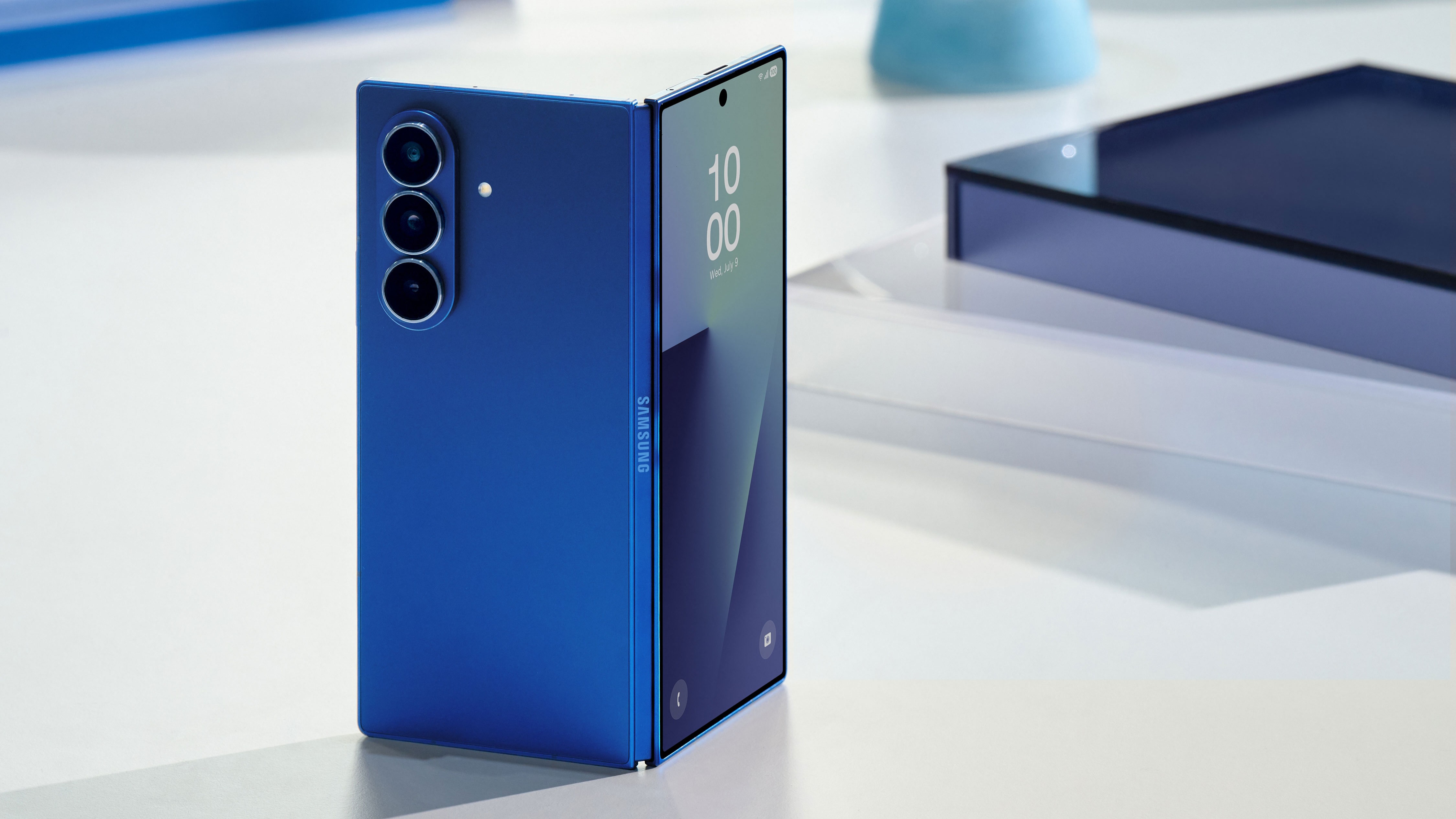 Samsung Galaxy Z Fold 7 half folded on a table standing upright