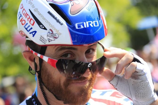 Luca Paolini gives the camera a cheeky grin before the stage starts