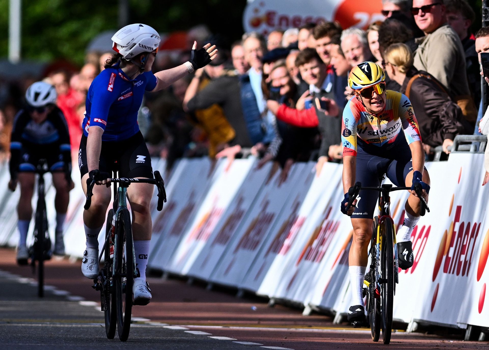 Charlotte Kool of Netherlands and Team Fenix-Premier Tech - Blue Points Jersey on second place and Barbara Guarischi of Italy and Team SD Worx - Protime on third place cross the finish line during the 28th Eneco Tour Women, Stage 1 a 79.5km a stage from Ede to Ede October 14, 2026 in Ede, Netherlands. (Photo by Luc Claessen/Getty Images)