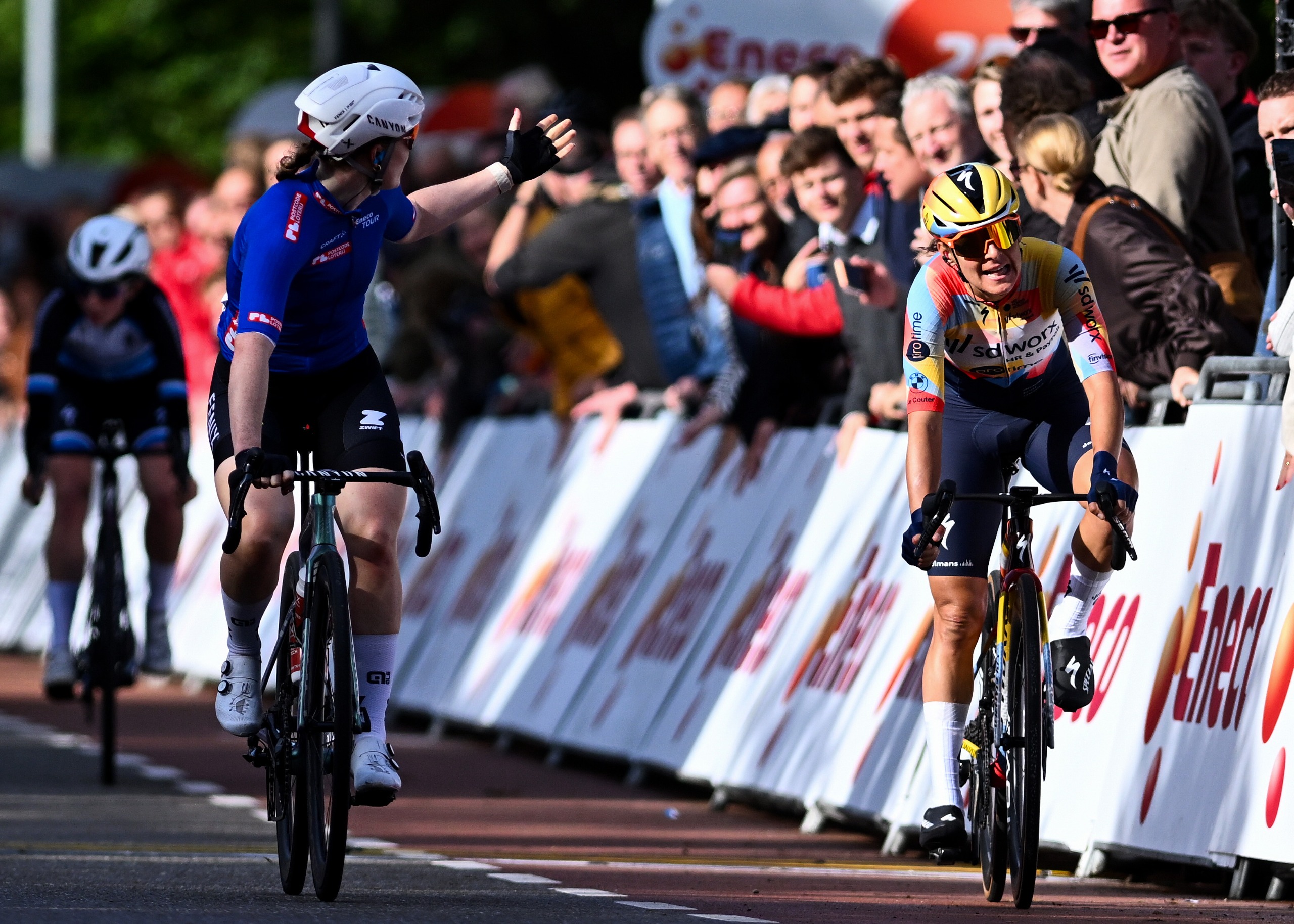 Charlotte Kool of Netherlands and Team Fenix-Premier Tech - Blue Points Jersey on second place and Barbara Guarischi of Italy and Team SD Worx - Protime on third place cross the finish line during the 28th Eneco Tour Women, Stage 1 a 79.5km a stage from Ede to Ede October 14, 2026 in Ede, Netherlands. (Photo by Luc Claessen/Getty Images)
