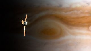 An artist's illustration shows NASA's Juno spacecraft slightly off-center to the left flying above Jupiter. A close-up of Jupiter's Great Red Spot fills the background of the image.