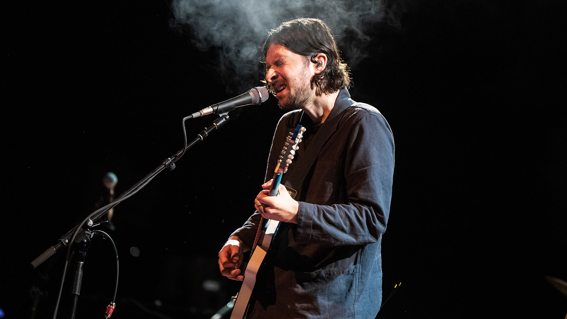 Mitch Rowland playing his 12-string electric guitar onstage at The Fillmore on February 25, 2024 in San Francisco, California
