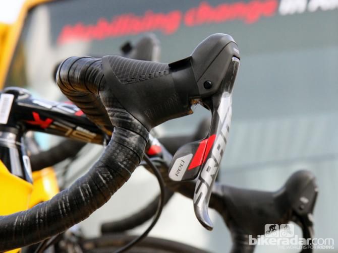 Strips of electrical tape keep crud out of SRAM's Red DoubleTap levers when they're up atop the team cars