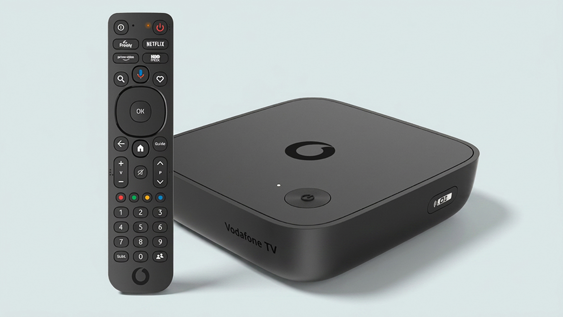 Vodafone TV box with remote on light green background