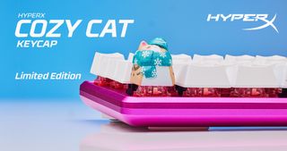 HyperX keyboard with a custom "Cozy Cat" keycap.