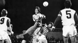 Soccer - European Cup Winners' Cup - Quarter Final - Newport v Carl Zeiss Jena - Second Leg - Somerton Park, Newport. Carl Zeiss Jena's goalkeeper Grapenthin punches the ball away from Newport's Keith Oakes.