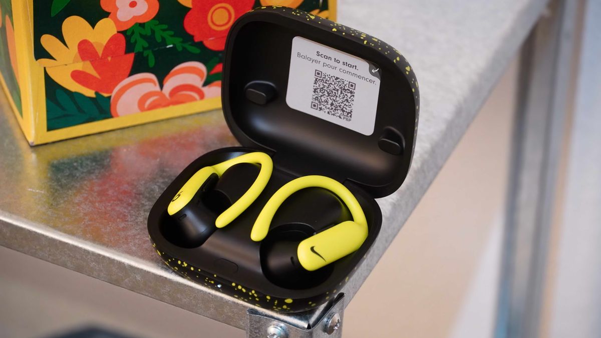 The Nike Special Edition variant of the Powerbeats Pro 2 in a volt and matte black colorway.