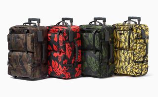Four suitcases, Brown, red, Green Yellow