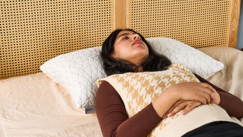 Tom&#039;s Guide Sleep Writer lying on her back on the Coop Original Adjustable Pillow