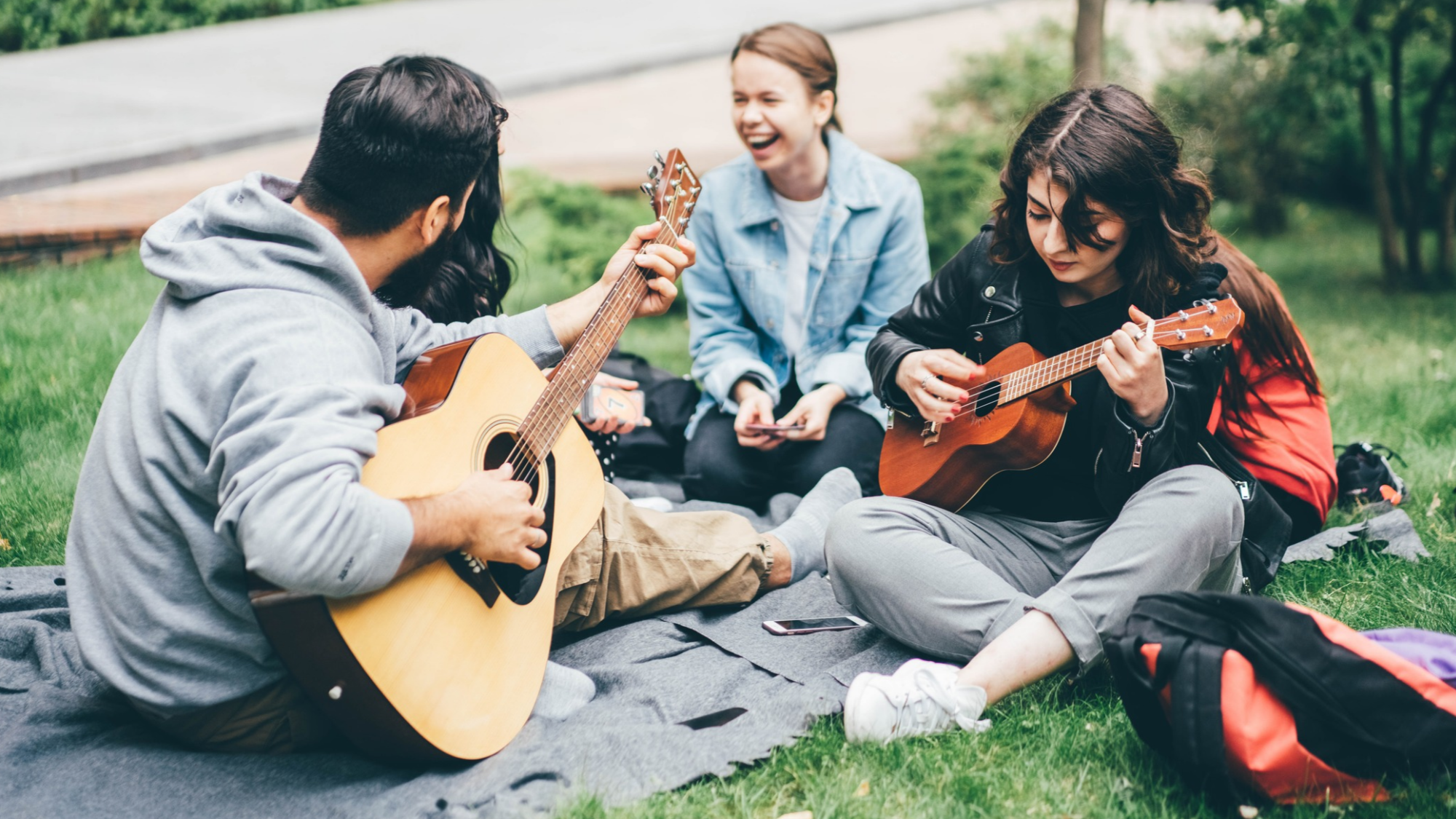 A group of young people playing music together