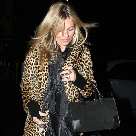 Kate moss wears the loewe amazon bag and a leopard jacket.