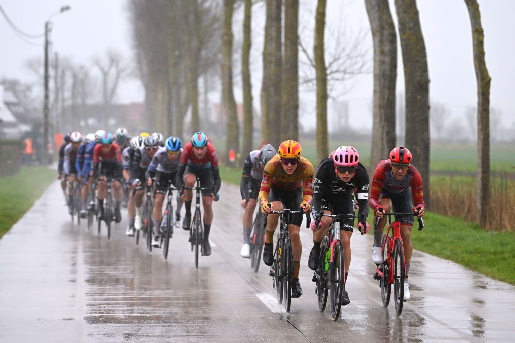 DE PANNE BELGIUM MARCH 22 LR Stian Fredheim of Norway and UnoX Pro Cycling Team Marijn van den Berg of The Netherlands and Team EF EducationEasyPost and Edward Theuns of Belgium and Team Trek Segafredo compete in the breakaway during the 47th Minerva Classic Brugge De Panne 2023 a 211km one day race from Brugge to De Panne on March 22 2023 in De Panne Belgium Photo by Luc ClaessenGetty Images