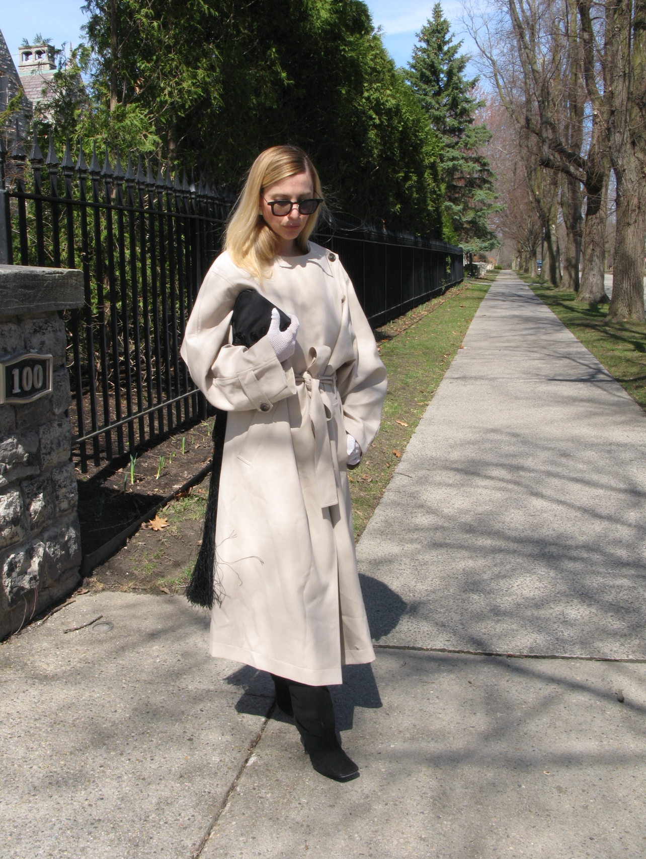 Kerry Pieri wearing a trench coat