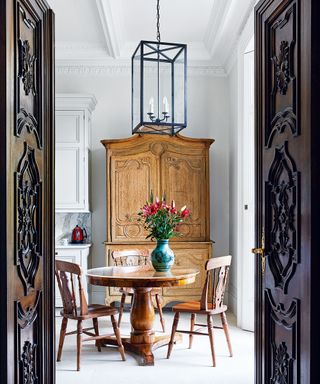 Dining room with antique table, chairs and cabinet