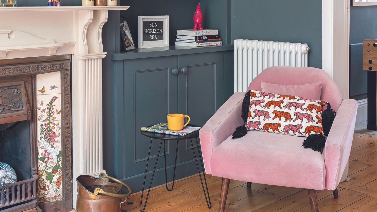 Living room with pink armchair and side table