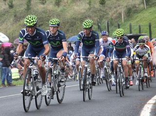 Movistar pushes the pace in the peloton.
