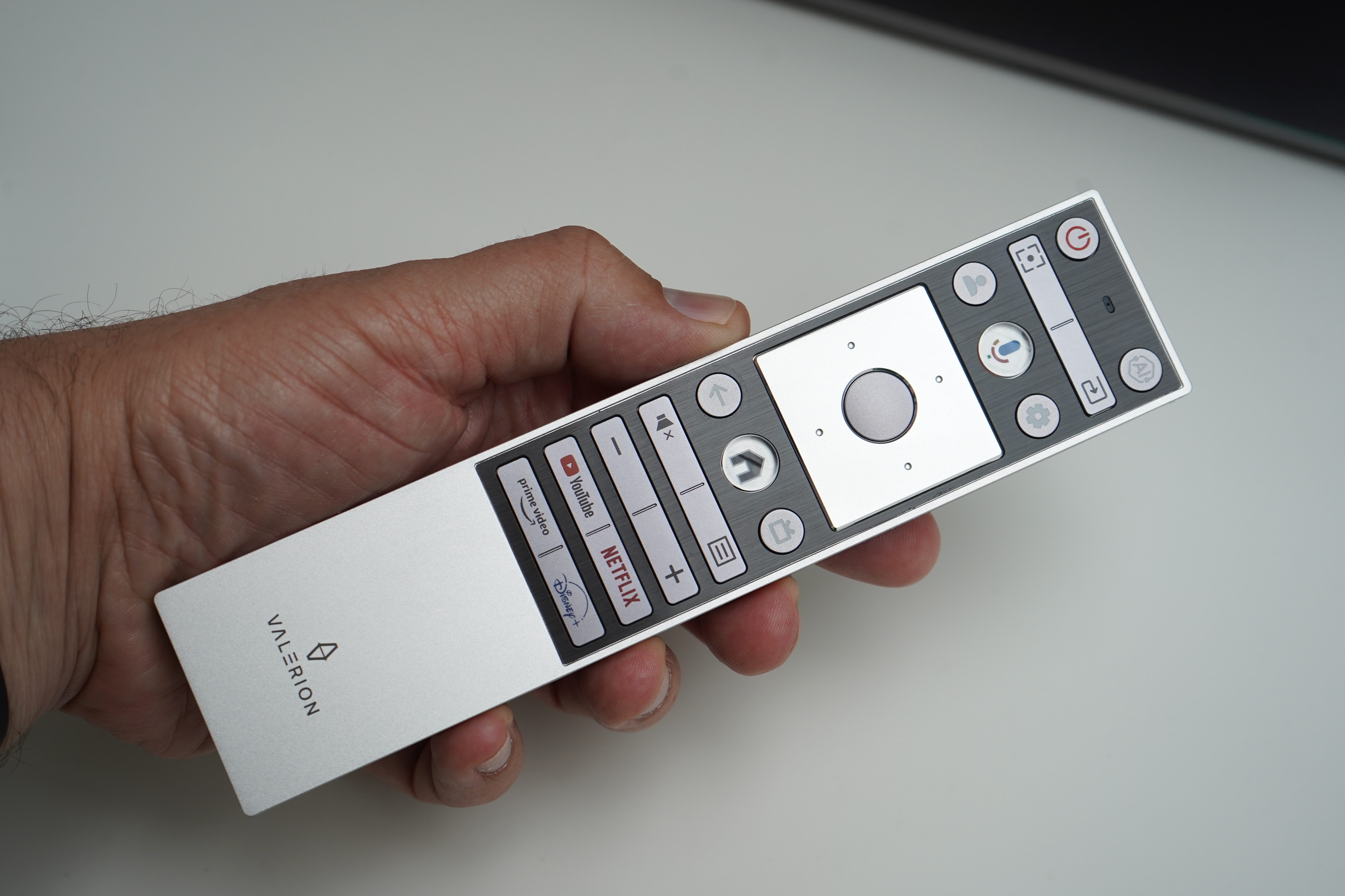 Valerion VisionMaster Pro2 remote in hand