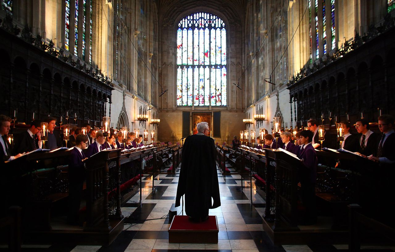 The Choir of King&#039;s College Cambridge conduct a rehearsal in King&#039;s College Chapel.