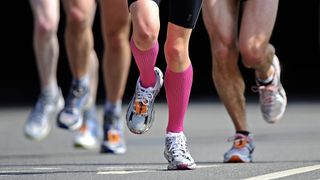 runners and different socks