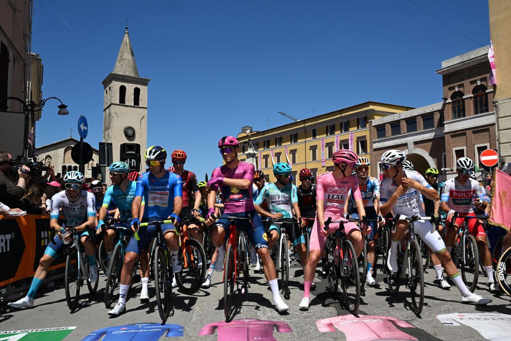 SPOLETO ITALY MAY 11 LR Phil Bauhaus of Germany and Team Bahrain Victorious Davide Ballerini of Italy and Astana Qazaqstan Team Lilian Calmejane of France and Team Intermarche Wanty Blue Mountain Jersey Connor Swift of The United Kingdom and Team INEOS Grenadiers Jonathan Milan of Italy and Team Lidl Trek Purple Points Jersey Martin Marcellusi of Italy and Team VF Group Bardiani CSF Faizane Tadej Pogacar of Slovenia and UAE Team Emirates Pink Leader Jersey Chris Hamilton of Australia and Team dsmfirmenich PostNL Luke Plapp of Australia and Team Jayco AlUla White best young jersey prior to the 107th Giro dItalia 2024 Stage 8 a 152km stage from Spoleto to Prati di Tivo 1451m UCIWT on May 11 2024 in Spoleto Italy Photo by Tim de WaeleGetty Images