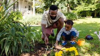 A man and his son gardening
