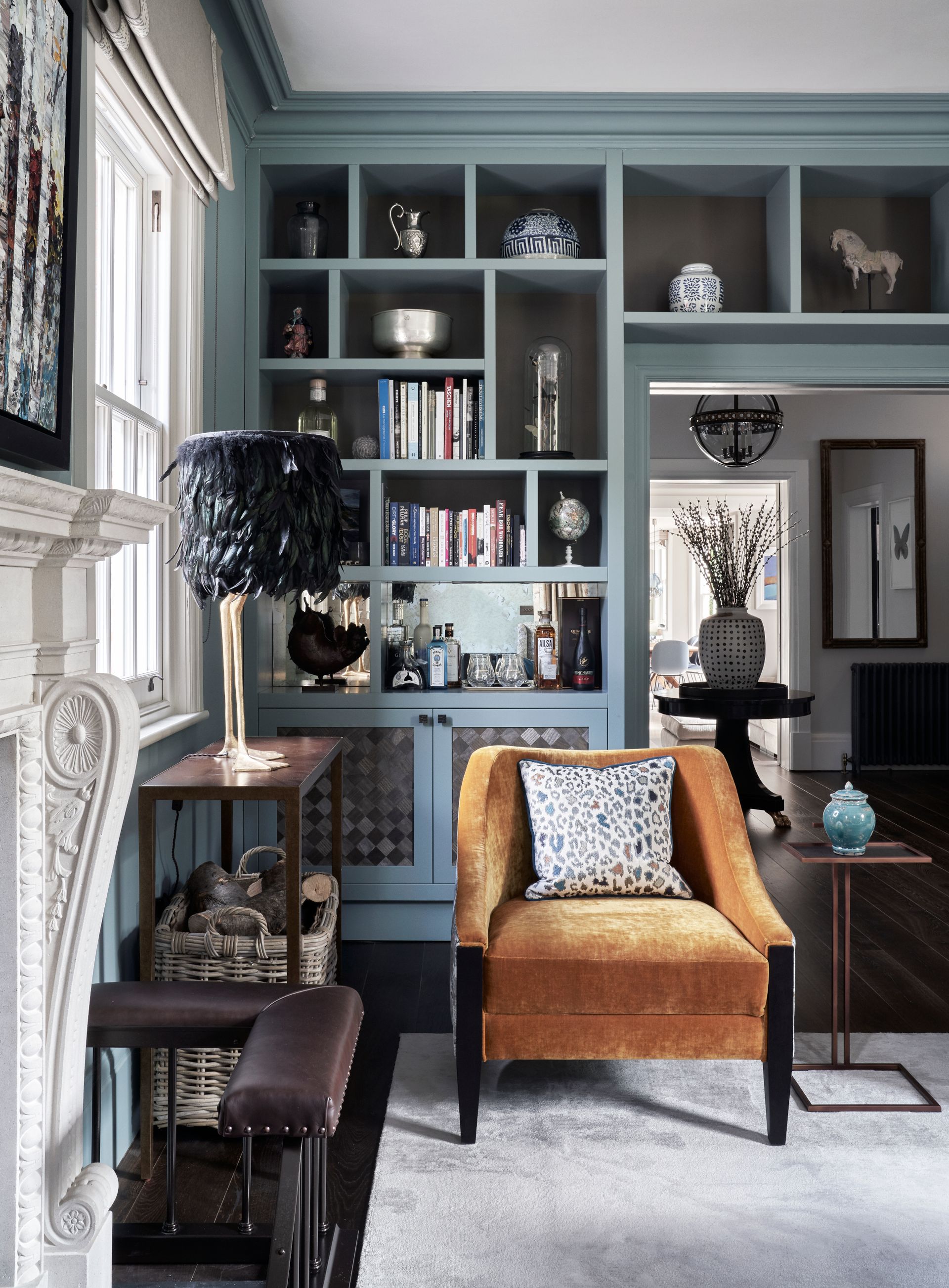 Book storage ideas on blue shelves