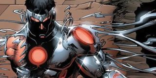Tony Stark puts on his Endo-sym Iron Man suit