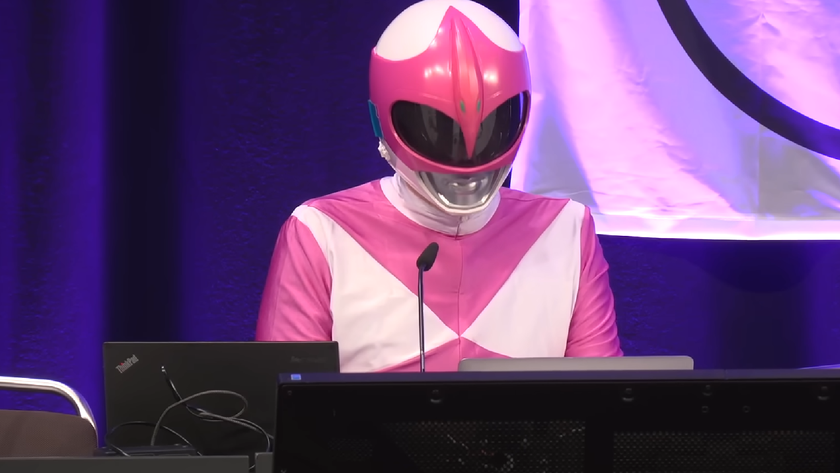 A hacker, dressed as the pink Power Ranger, hacks into and deletes white supremacist websites during the Chaos Communication Congress.