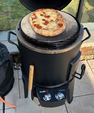 pizza cooking on Char-Broil Big Easy