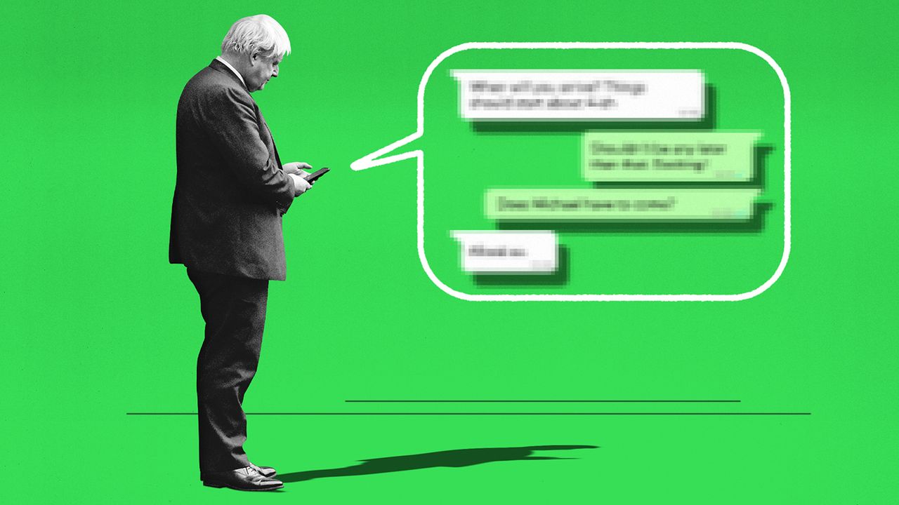 Boris Johnson holding a mobile phone with WhatApp messages being shown