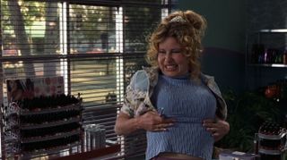 Jennifer Coolidge smiling after her bend. and snap in Legally Blonde