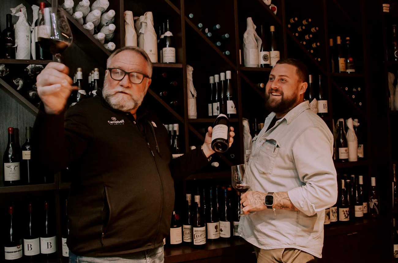 Two men in a wine bar Judd's Local Cape Town