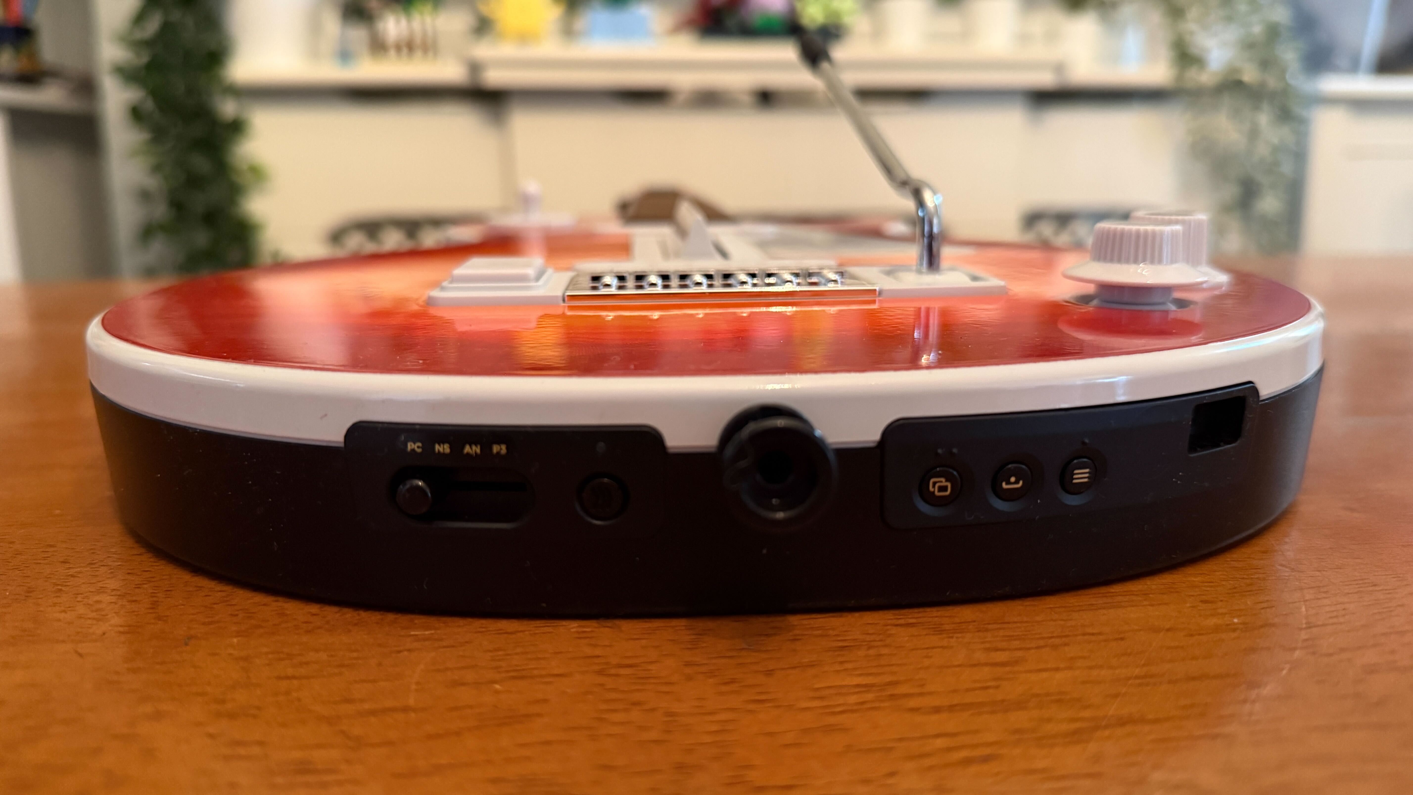 The bottom connectivity functions on the CRKD Gibson Les Paul guitar controller