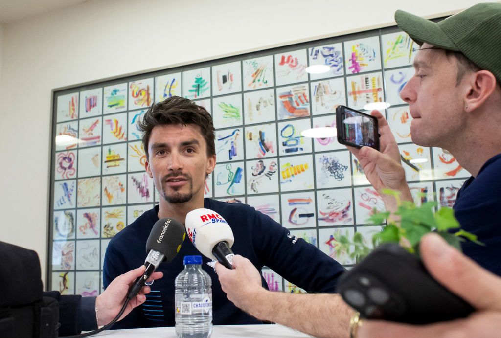 French Julian Alaphilippe (C) addresses a press conference of the Soudal Quick-Step cycling team ahead of the Ronde van Vlaanderen / Tour des Flandres / Tour of Flanders cycling race, in Turnhout on March 29, 2024. The 108th edition of the Flandres Tour cycling race will take place on Sunday March 31, 2024. (Photo by KRISTOF VAN ACCOM / Belga / AFP) / Belgium OUT